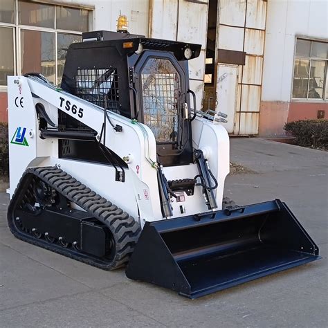 running a tracked skid steer on rocks|best tracks for skid steer.